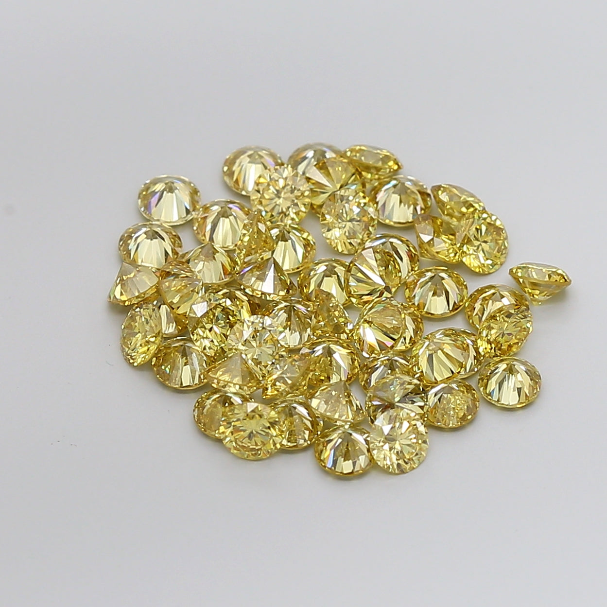 Melee Vivid Yellow Lab Diamonds - Fantasy Color / VS clarity